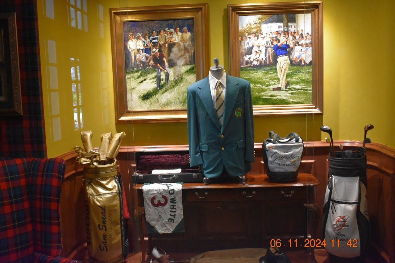 A display of Sam Snead's green jacket, golf bags and paintings at The Greenbrier in West Virginia