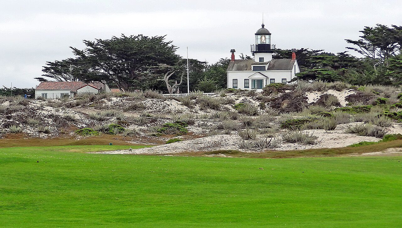 The Point Pinos Lighthouse and coastal dunes beside Pacific Grove Golf Links