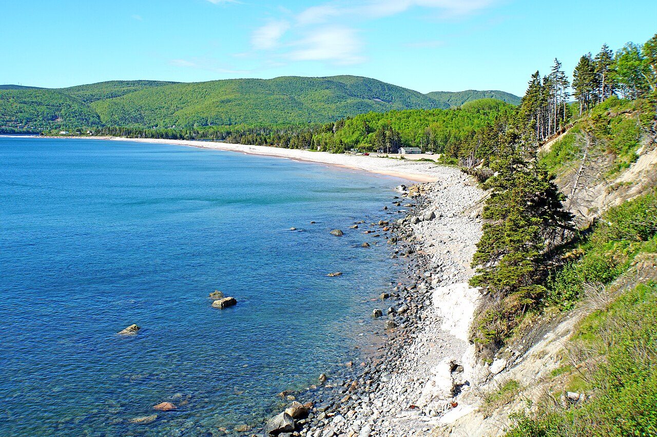 Ingonish Beach and the forested headland near Highlands Links in Cape Breton Highlands National Park