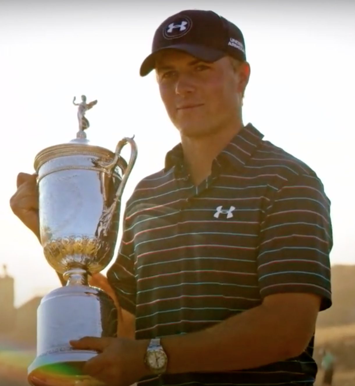 Jordan Spieth holding the U.S. Open trophy after winning at Chambers Bay in 2015