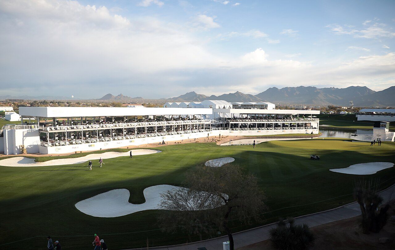 The 16th-hole stadium at TPC Scottsdale, with grandstands and skyboxes wrapped around the green