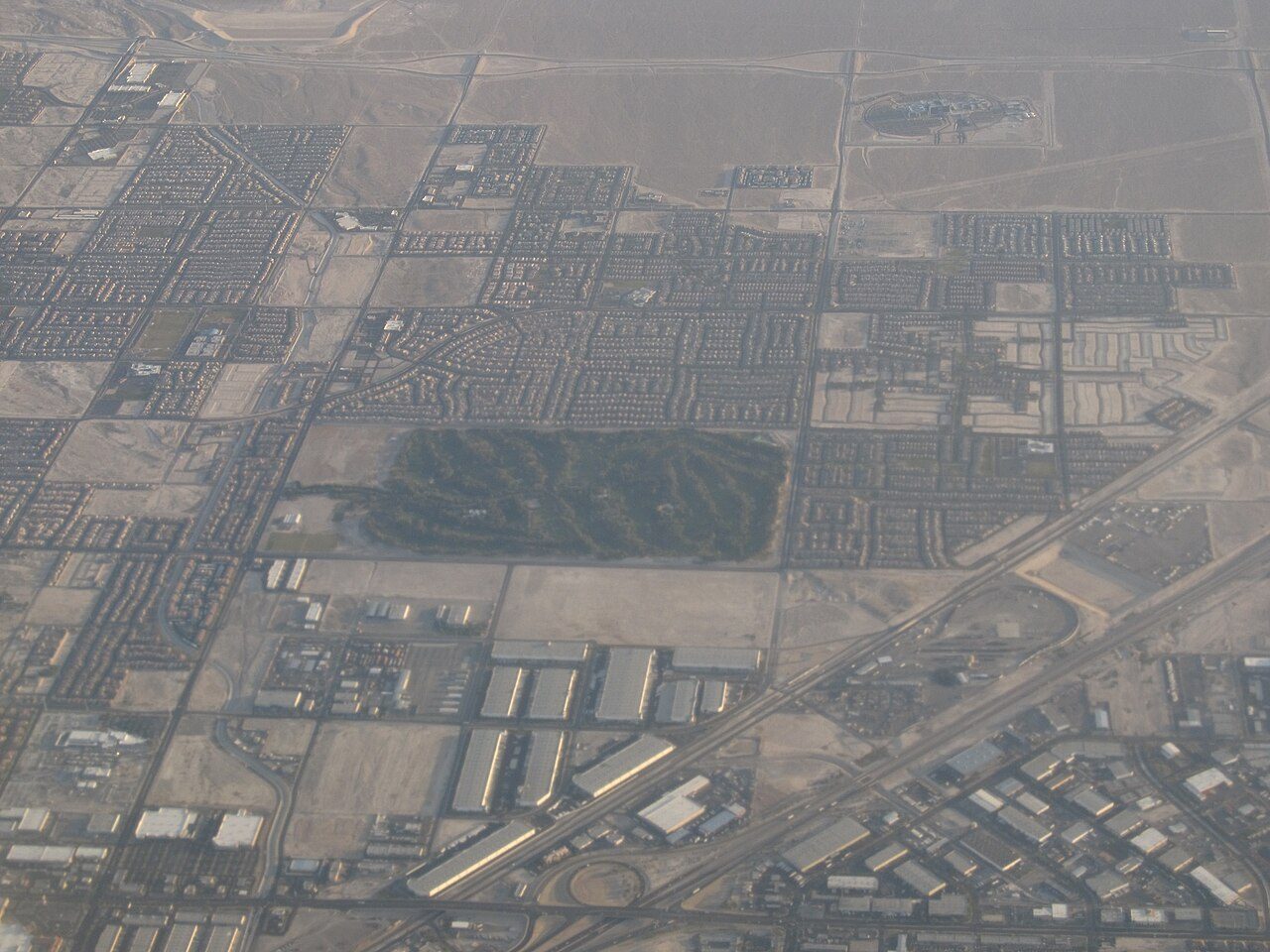 Shadow Creek golf course seen from the air as a hidden green oasis in the desert north of Las Vegas